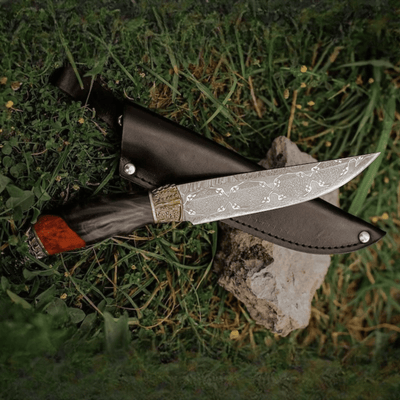 Unique Damascus hunting knife with dragon head handle