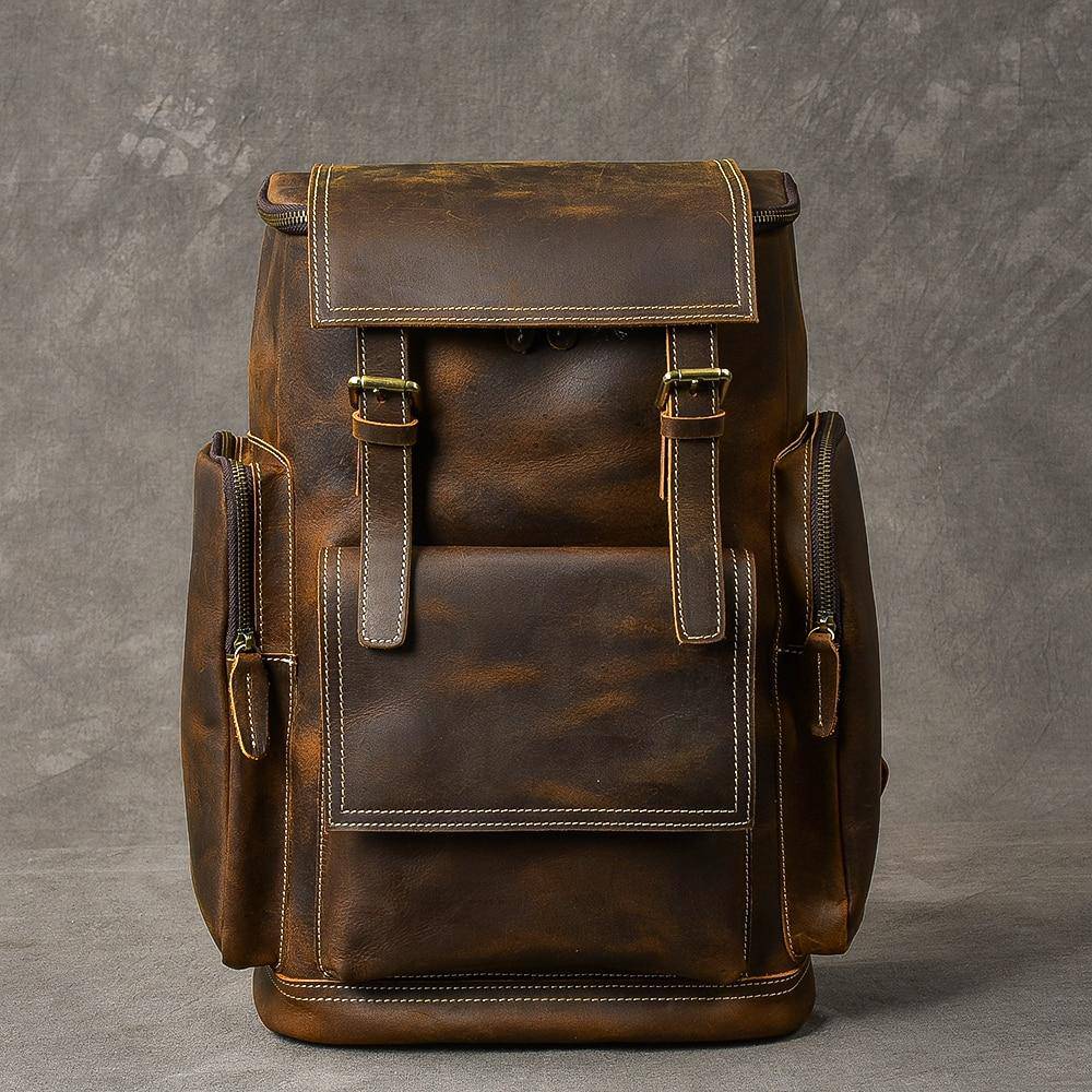 Explore in style with a retro brown leather travel backpack designed for men