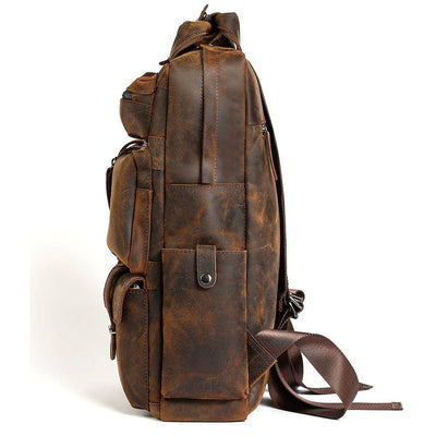 Functional 20 to 35-liter travel backpack in brown leather for 15.6-inch laptops