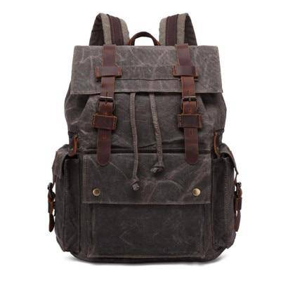 Explore in nostalgic fashion with a 20L retro canvas leather backpack