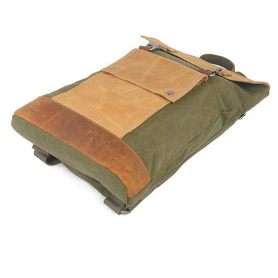 Chic travel-friendly daypack in vintage canvas and leather with adjustable volume