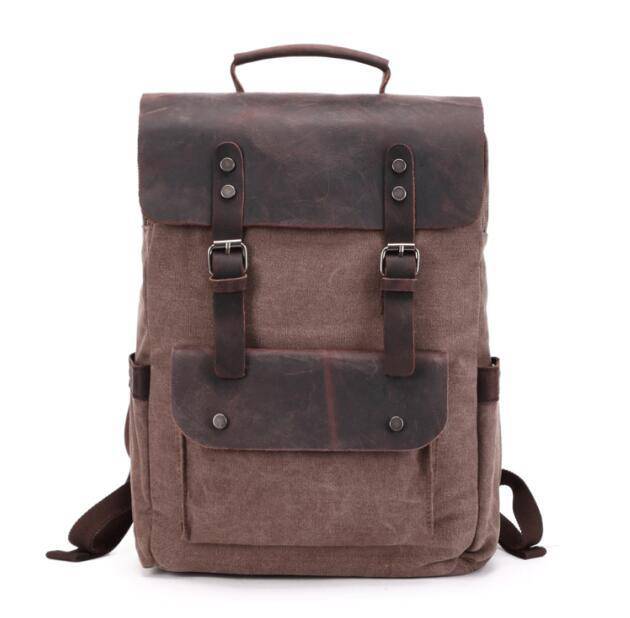 Durable 14-inch laptop backpack with canvas and leather