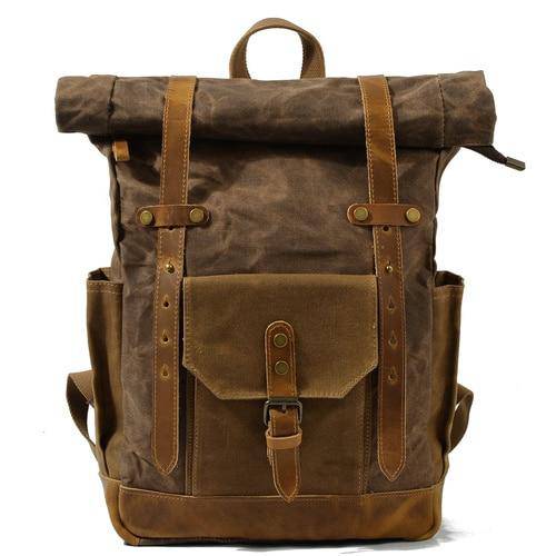 Explore in style with a large-capacity backpack in vintage canvas and genuine leather