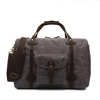 Waxed canvas luggage with practical pocket design