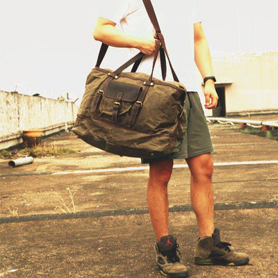 Waxed canvas travel bag with dedicated shoe pocket