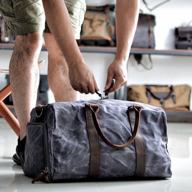 Durable waxed canvas weekenders with built-in shoe storage